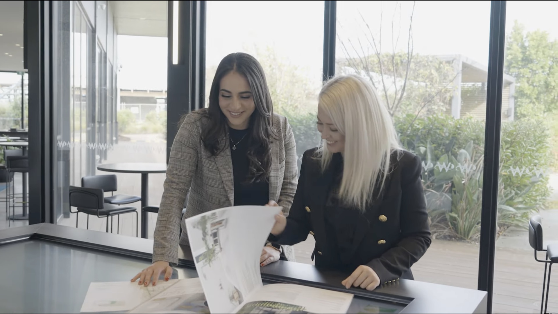 Tomorrow Homes team reviewing design plans